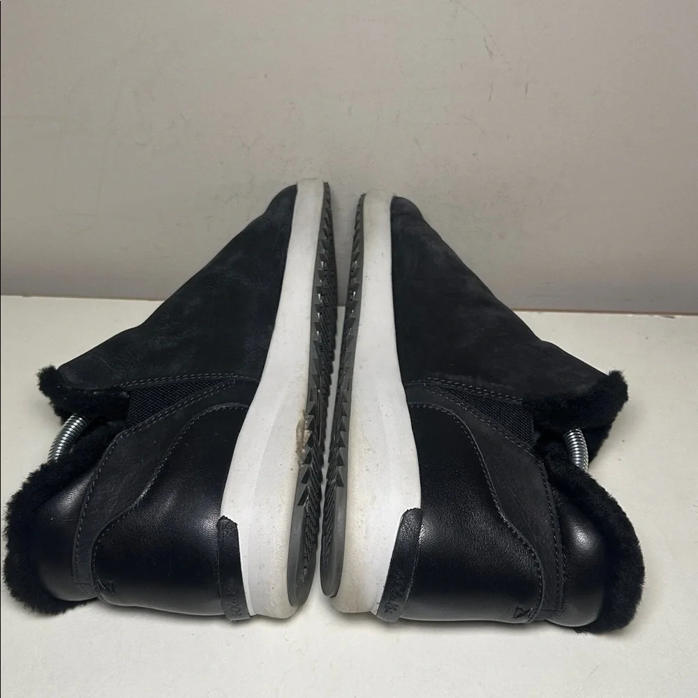 Olukai women’s Black faux fur leather Slip-On booties